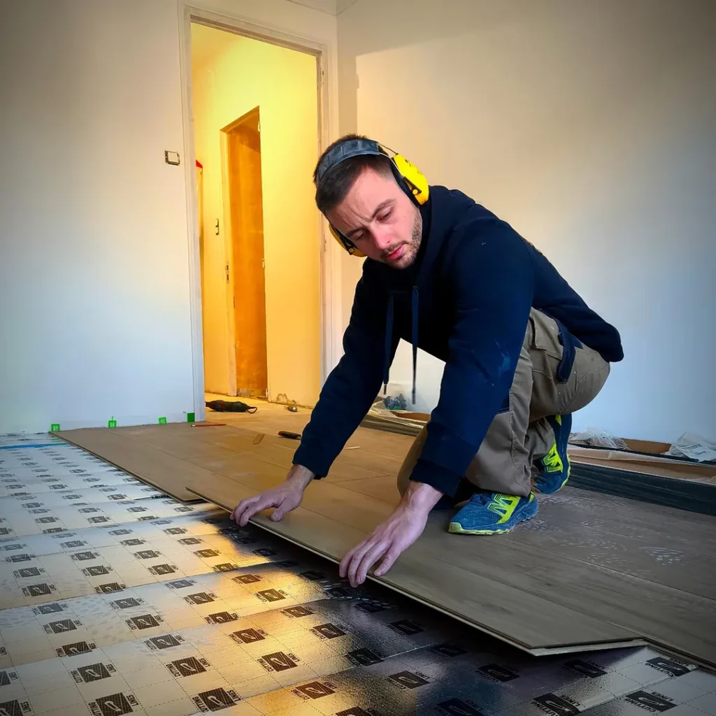 Pose de parquet en coupe de pierre